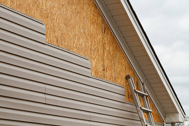 Professional Siding Installation technician working in Matthews, NC